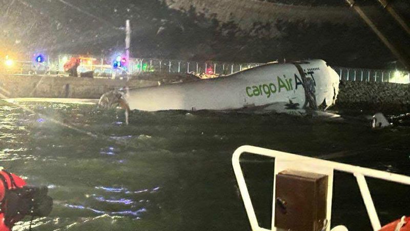 Hong Kong: Cargo plane skids off runway, kills 2 people
