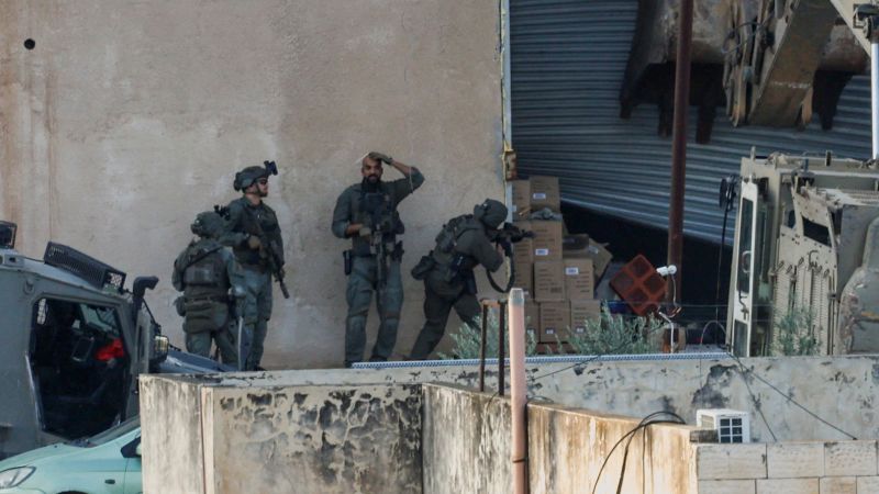 Israeli forces kill two men who appeared to have surrendered during operation in the West Bank