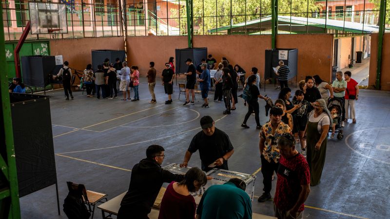 Chile’s presidential election heads to tense run-off between communist and far-right candidates