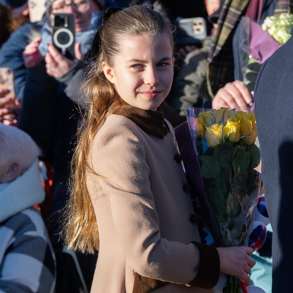 Princess Charlotte takes a selfie with a fan