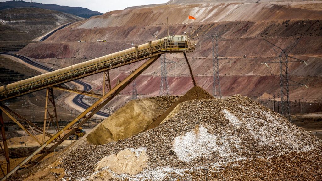 Stocks with the biggest moves at midday: NEM, AAPL, SNDK, DECK