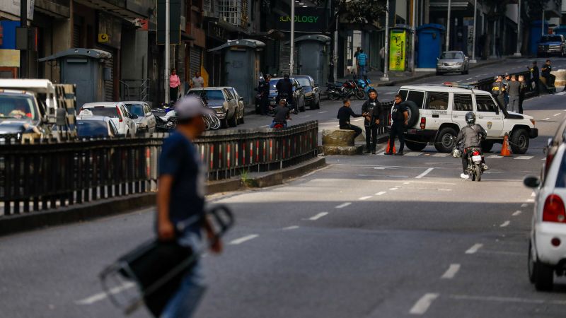 Days after US attack, exhausted but resilient Venezuelans try to return to normal life amid fears of repression