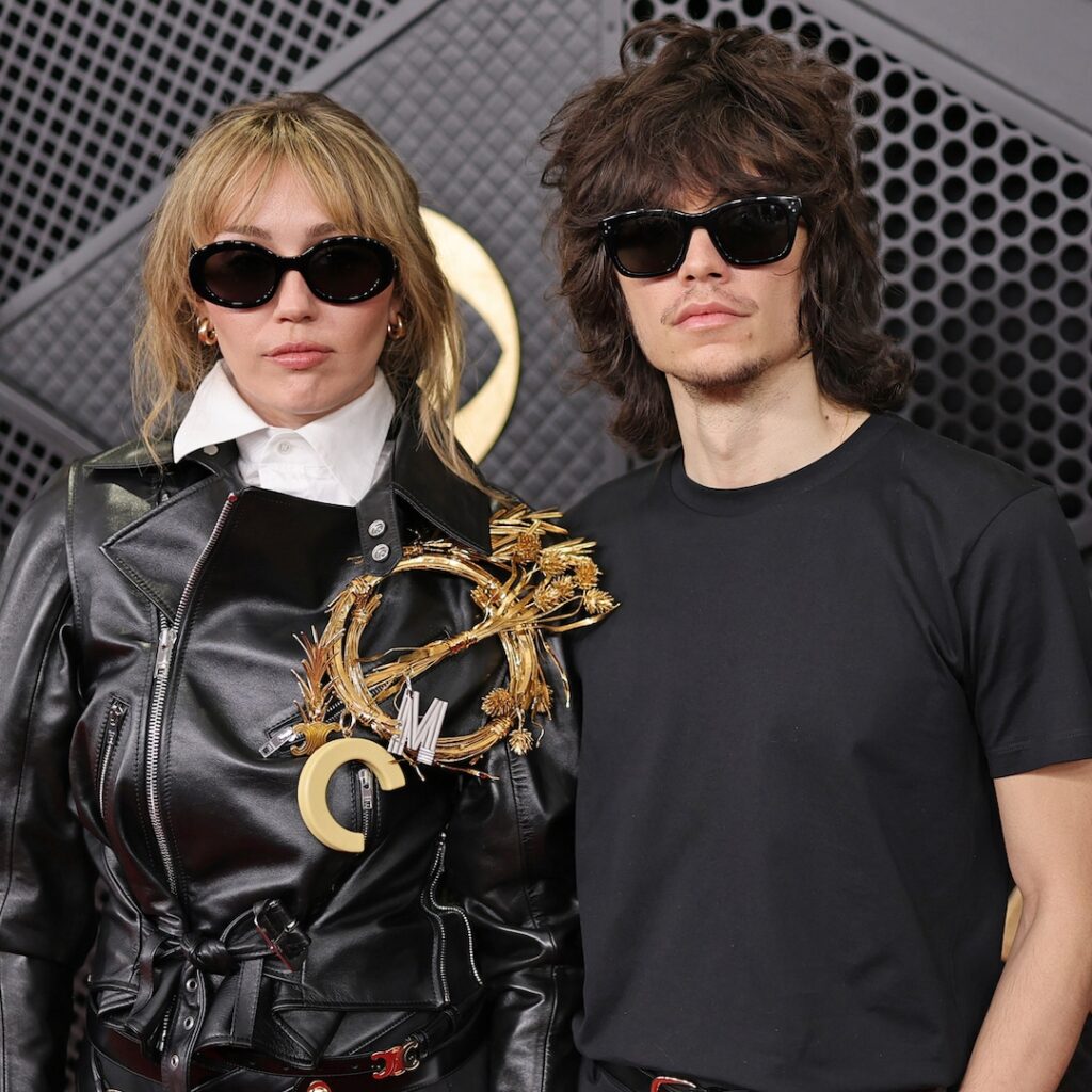 Miley Cyrus and Max Morand arrive